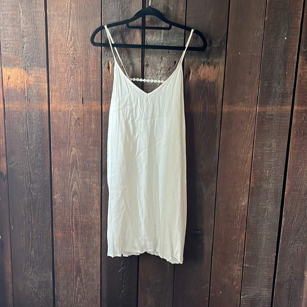 White slip dress with floral detail